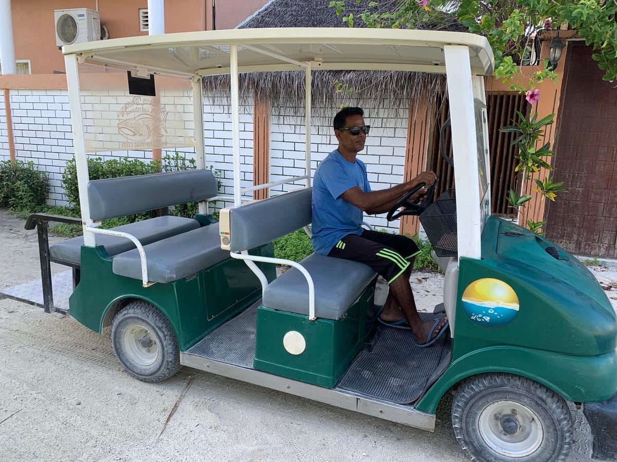 Shamar’s green buggy in front of the house